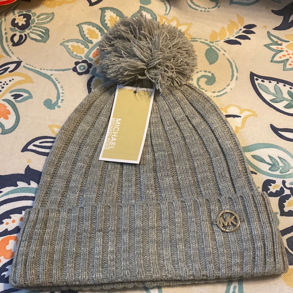 Michael Kors gray knit cap. Cute pompom and MK logo.